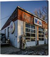 A Vintage Gas Station And Vintage Cars In Early Morning Light Canvas Print