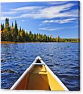 Canoe Bow On Lake Canvas Print