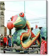 Dragon With A Red Nose In A Parade Canvas Print