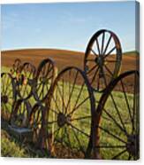 Fence Of Wheels Canvas Print