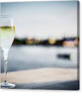 Glass Of Champagne At Modern Outdoor Bar At Sunset Canvas Print