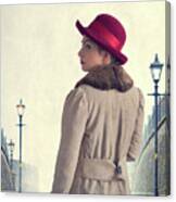 Historical Woman In An Overcoat And Red Hat Canvas Print