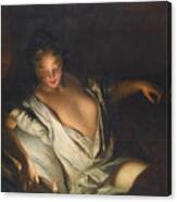 Lady With An Open Decollete Reclining On A Bed Lighting A Candle Canvas Print