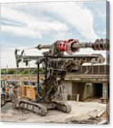 Large Rotary Drill And Excavator On Construction Site Canvas Print