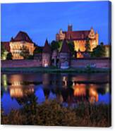 Malbork Castle By Night In Poland Canvas Print