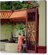 Monk Opens Main Gate And Readies Sam Poh Chinese Buddhist Temple Cameron Highlands Malaysia Canvas Print