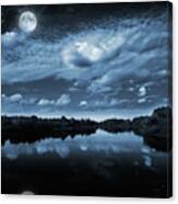 Moonlight Over A Lake Canvas Print