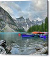 Moraine Logs And Canoes Canvas Print
