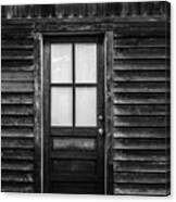 Old Wood Door And Light Black And White Canvas Print