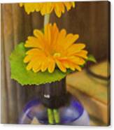 Orange Flowers Blue Vase Canvas Print