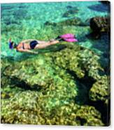 Pretty Woman In Bikini Snorkeling Through Turquoise Water At The Coast Canvas Print