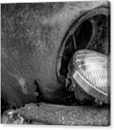 Resting Headlight Of Rusty Car Canvas Print