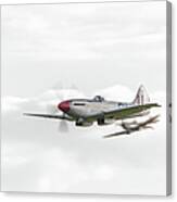 Silver Spitfire In A Cloudy Sky Canvas Print