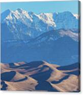 Snow Covered Rocky Mountain Peaks With Sand Dunes Canvas Print