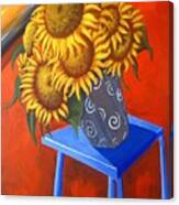Sunflowers On Blue Table Canvas Print
