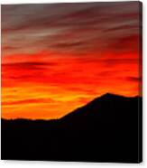 Sunrise Against Mountain Skyline Canvas Print