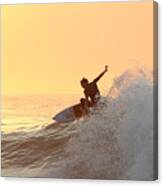 Surfing In Golden Sky Canvas Print