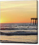 Surfing In The Setting Sun Canvas Print