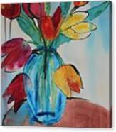 Tulips In A Blue Glass Vase Canvas Print