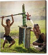 Two Young Boy Rocking Groundwater Bathe In The Hot Days. Canvas Print