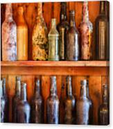 Vintage Liquor Bottles On A Shelf Canvas Print