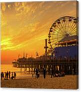 Visitors enjoy sunset above Santa Monica Pier in Los Angeles