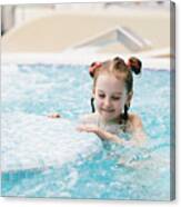 Young Girl Swimming In A Hot Tub. Canvas Print
