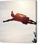 Young Man Levitating In The Air. Canvas Print