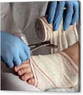 Nurse Tying Bandage On Patient's Foot #10 Canvas Print