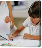 Child Colouring Shapes During Assessment #4 Canvas Print