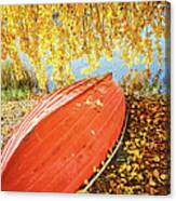 A Boat Covered With Autumn Leaves Canvas Print