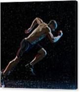 Athlete Runner Running Through Rain Canvas Print