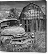 Black And White Of Rusted Chevy Pickup Truck In A Rural Landscape By A Mail Pouch Tobacco Barn Canvas Print
