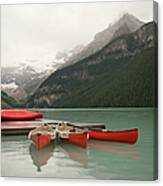 Canoes On Lake Louise, Banff National Canvas Print
