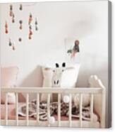 Cot With Mobile Canvas Print