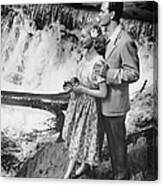 Couple Standing Near Waterfall Canvas Print