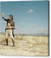 Cowboy Standing In Desert With Empty Canvas Print