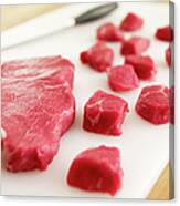 Cubed Raw Steak On Cutting Board Canvas Print