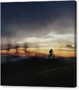 Cycling In Dusk Canvas Print