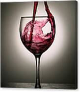 Dramatic Red Wine Splash Into Wine Glass Canvas Print