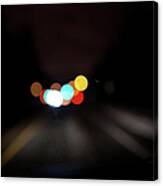 Driving At Night With Colourful Lights Canvas Print
