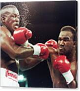 Evander Holyfield Punching Buster Canvas Print