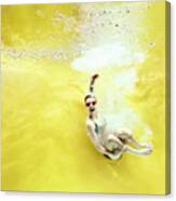 Girl Jumping Into Water On Yellow Canvas Print