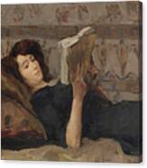 Girl Reading On A Sofa Canvas Print