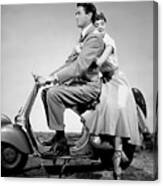 Gregory Peck And Audrey Hepburn On Moped Canvas Print