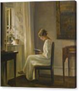 Interior With A Woman Reading Canvas Print
