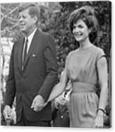 Jack And Jackie Kennedy Hold Hands Canvas Print