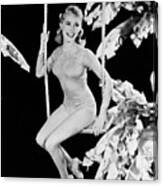 Janet Leigh Perched On A Swing Canvas Print