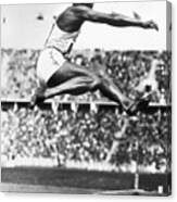 Jesse Owens In Midair Canvas Print