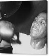 Joe Frazier Working Out With Punching Canvas Print